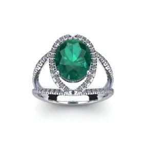 1 1/2 Carat Oval Shape Emerald And Halo Diamond Ring In 14 Karat White Gold